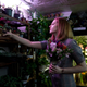 Between gigs, Donna picks up some flowers for a friend.